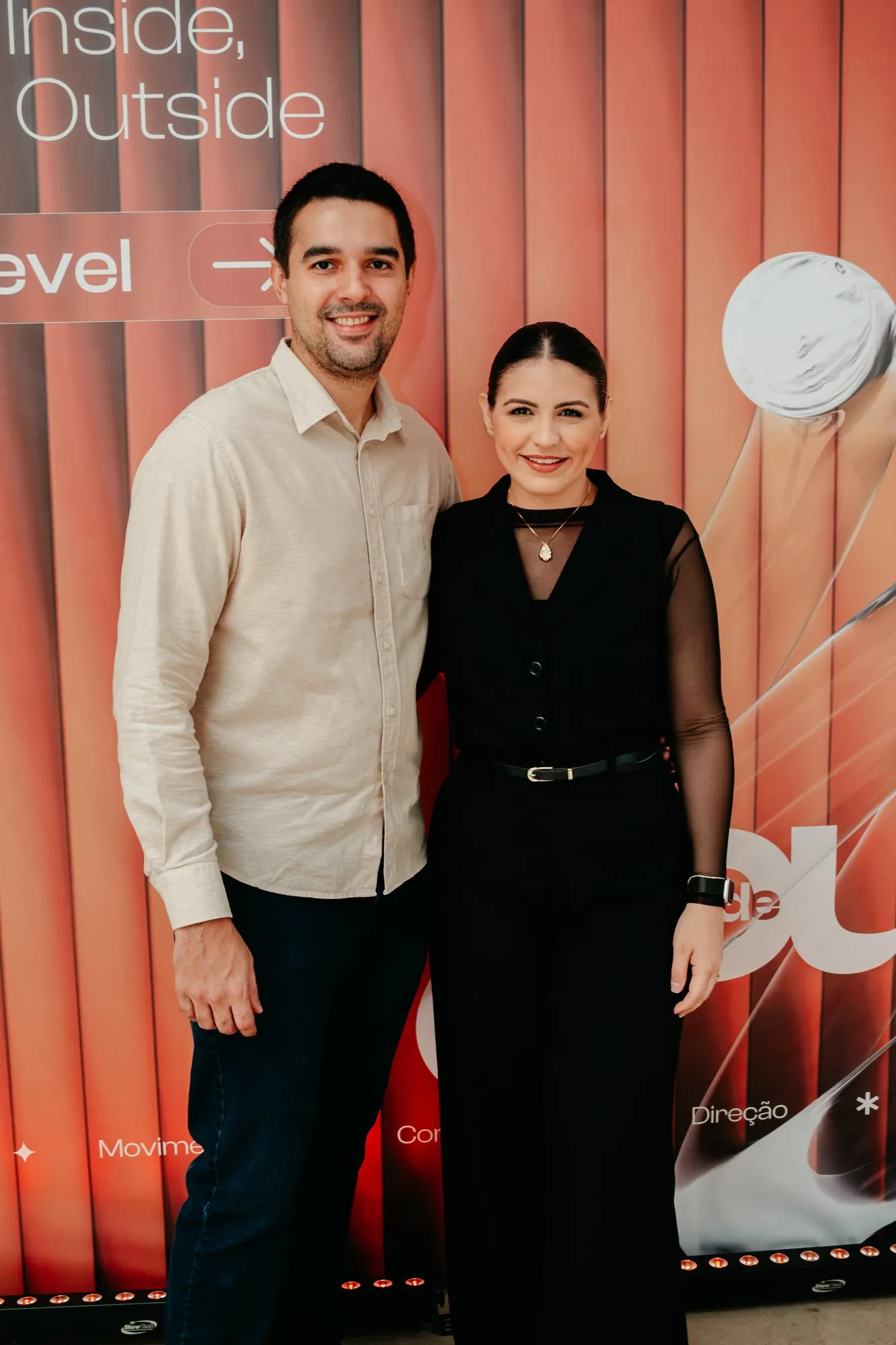Participantes no painel de fotos do evento